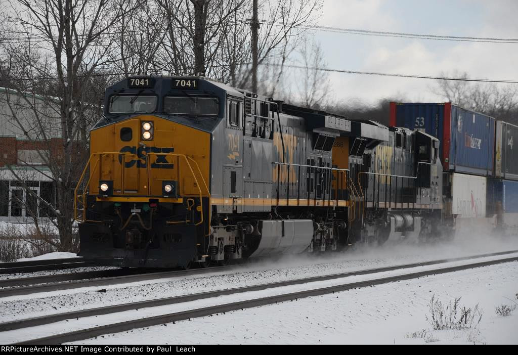 Stack train rolls west